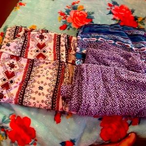 One is a skirt long skirt with a little slit the other the purple pants